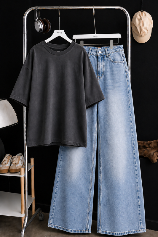 DARK GREY BAGGY TEE WITH ICE BLUE FADED WIDE LEG JEANS.